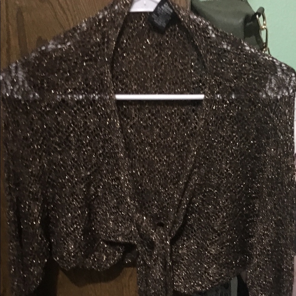 Elbow long top to go over dress or tank top.